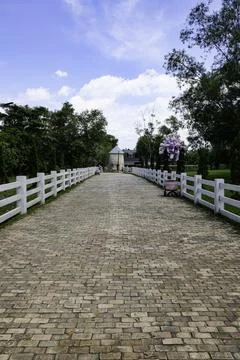 Rustic stone path leading to farmhouse Stock Photos