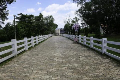 Rustic stone path leading to farmhouse Stock Photos