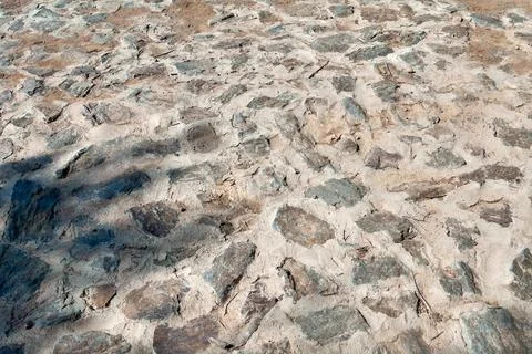 Rustic stone pavement texture sun Stock Photos