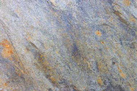 Rustic Stone Tile Texture with Weathered Gray and Warm Orange Accents Stock Photos