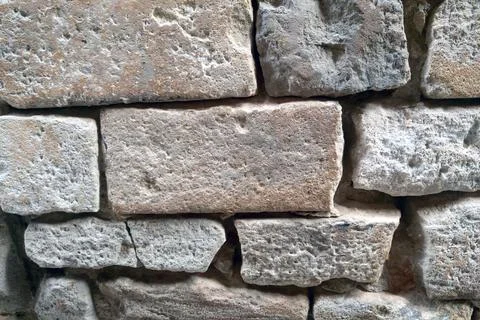 Rustic Stone Wall Texture for Architectural and Design Projects 스톡 사진