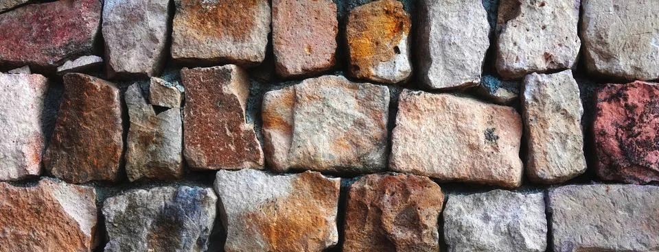 Rustic Stone Wall Texture Background With Natural Rock Pattern Stock Photos