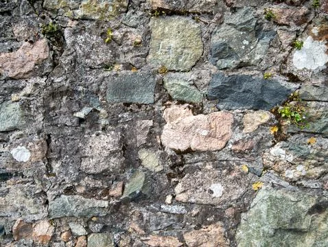 Rustic stone wall texture background Stock Photos