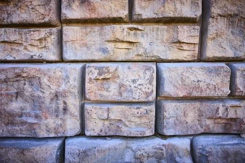 Rustic Stone Wall Texture Close-Up in Soft Daylight Stock-Fotos