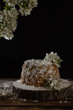 Rustic style apple bundt cake with powdered sugar on old wooden table Stock Photos