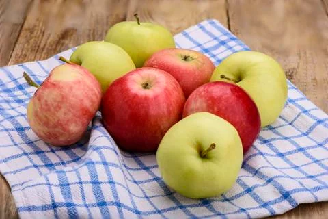 Rustic style. Fresh red and green apples Stock Photos