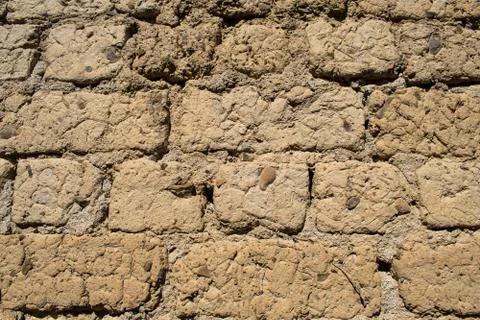 Rustic style. Old walls. Old masonry. Clay background. Stock Photos