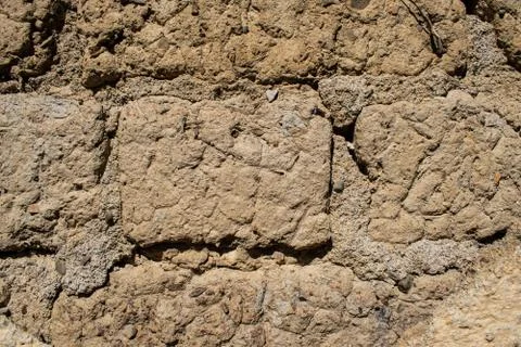 Rustic style. Old walls. Old masonry. Clay background. Stock Photos