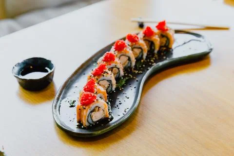 Rustic sushi on a wooden table Stock Photos