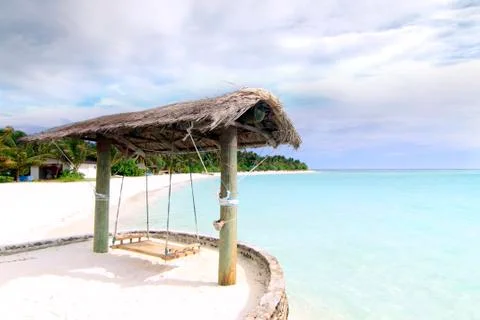 Rustic swing by the beach Stock Photos