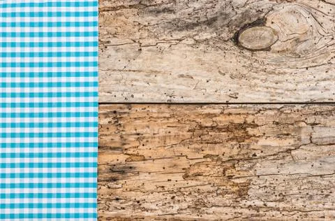 Rustic table background with blue fabric napkin Stock Photos