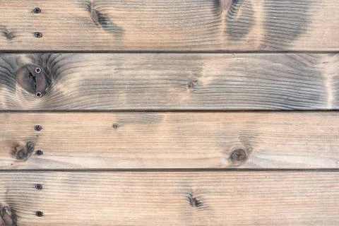 Rustic table built with aged wooden planks Stock Photos