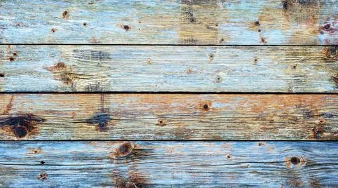 Rustic table built with aged wooden planks. Abstract background. Stock Photos