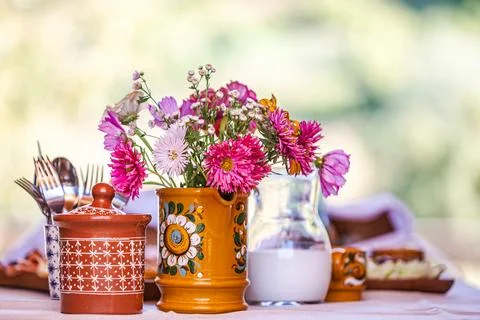 Rustic Table with Floral Decor Stock Photos