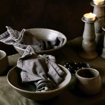 Rustic table setting with craft ceramic tableware Stock Photos