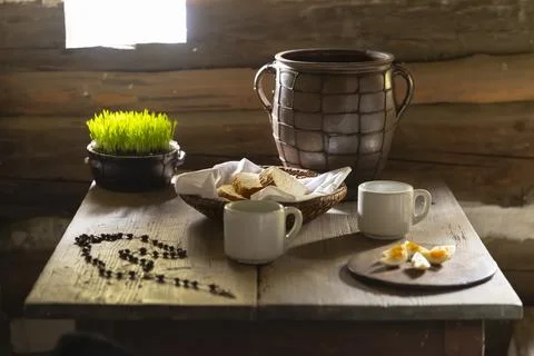 Rustic table setting with Easter grass and rosary Stock Photos