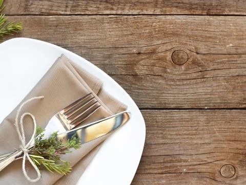 Rustic table setting on old wooden table Stock Photos