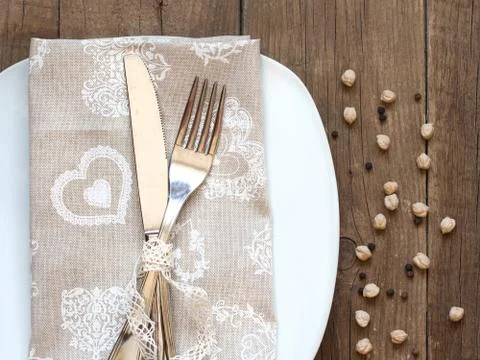 Rustic table setting on old wooden table Stock Photos