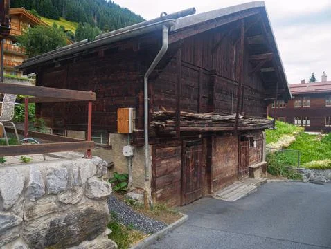 Rustic timber architecture building in a Swiss mountain village destination 库存照片