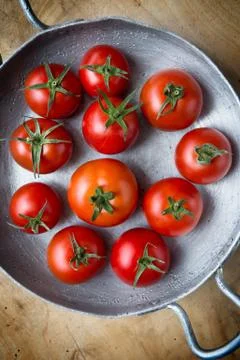 Rustic tomatoes. top view Stock Photos