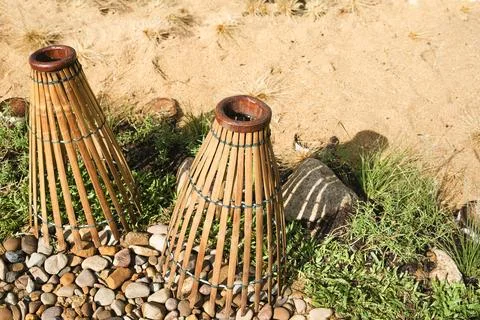 A rustic traditional bamboo fish trap, also known as bubu or lukah as outdo.. Stock Photos