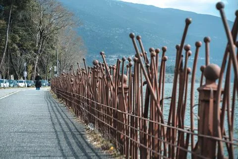 Rustic Twisted Metal Railing by Lake Pamvotida in Ioannina, Greece Stock Photos