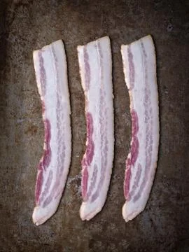 Rustic uncooked bacon Stock Photos