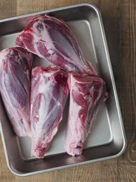 Rustic uncooked lamb shank Stock Photos