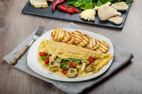 Rustic vegetarian omelette Stock Photos