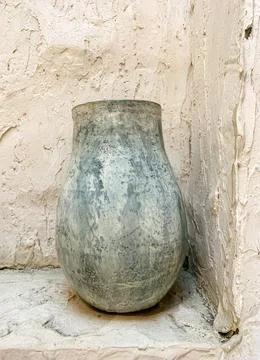 Rustic vintage clay pot. front view, close up. Copy space. Stock Photos