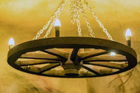 Rustic wagon wheel chandelier Stock Photos