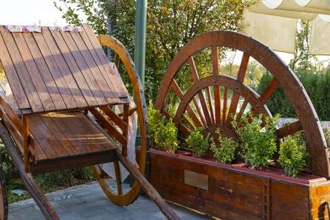 Rustic Wagon Wheel Garden Decor Stock Photos