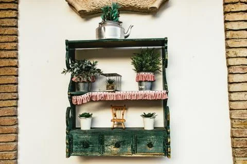 Rustic wall decoration with potted plants Stock Photos