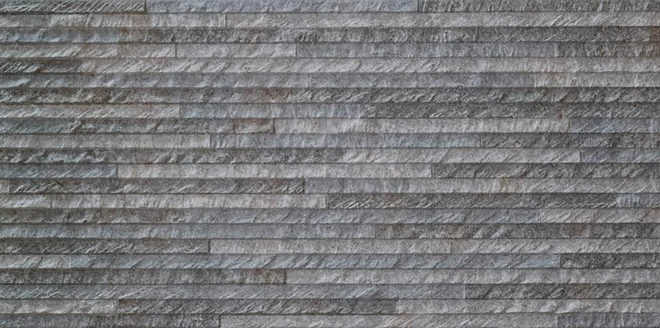 Rustic wall texture formed by small bricks Stock Photos