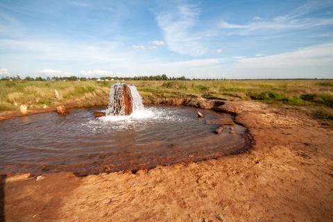 Rustic Waterfall in Open Field Stock Photos