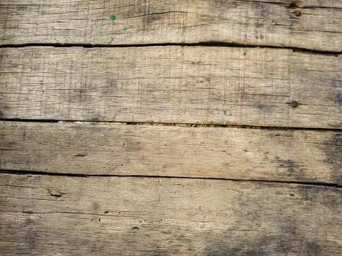 Rustic weathered barn wood background with knots and nail holes Stock Photos