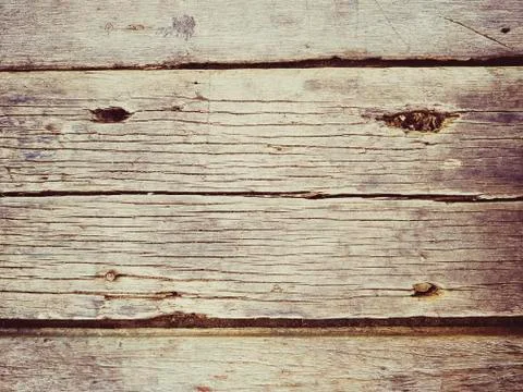 Rustic weathered barn wood background with knots and nail holes Stock Photos