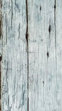 Rustic weathered barn wood background with knots and nail holes  vertical mob 写真素材