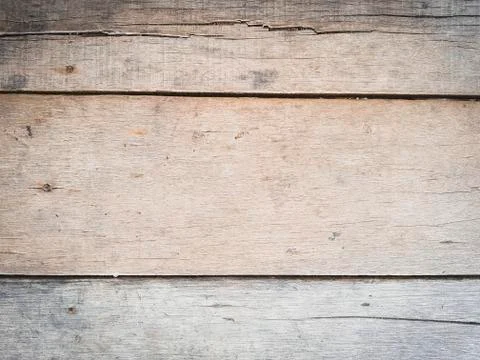 Rustic weathered barn wood background with knots and nail holes Stock Photos