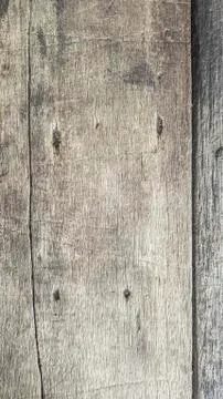 Rustic weathered barn wood background with knots and nail holes  vertical mob Foto stock