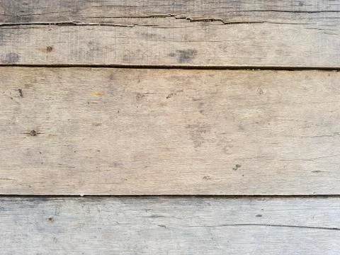 Rustic weathered barn wood background with knots and nail holes Stock Photos