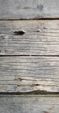 Rustic weathered barn wood background with knots and nail holes  vertical mob Stock Photos