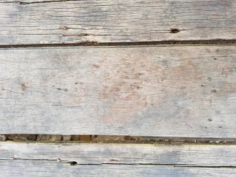Rustic weathered barn wood background with knots and nail holes Stock Photos