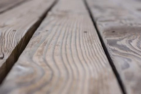 Rustic weathered barn wood background with knots and nail holes Stock Photos