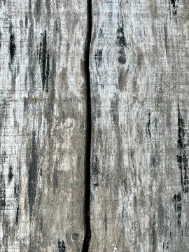 Rustic Weathered Wood Texture Background with a Deep Natural Crack Vertically Stock Photos