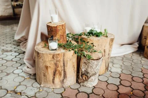Rustic wedding decor on a timber background. Main table setting for bride and Stock Photos