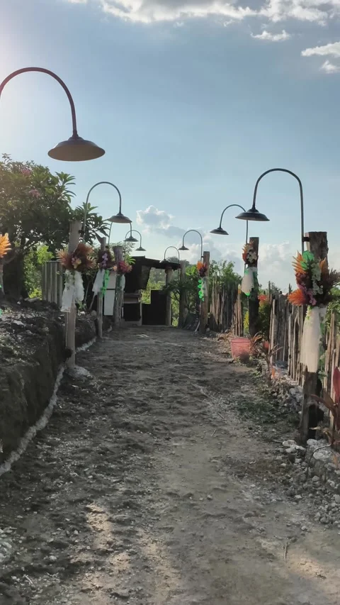 Rustic Wedding Pathway with Vintage Lamps and Floral Decor Stock Footage 340464582