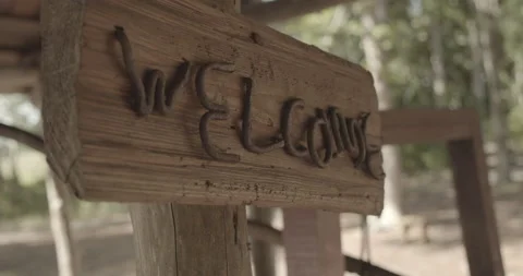 Rustic Welcome Sign Made from Iron and Wood Stock Footage 153066655
