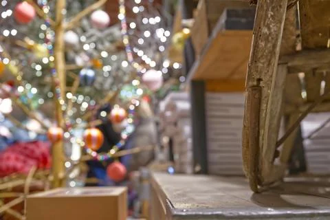 Rustic Wheelbarrow with Christmas Tree Background Stock Photos