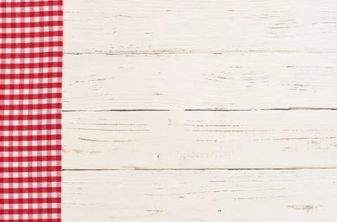 Rustic white kitchen table background with red napkin Stock Photos